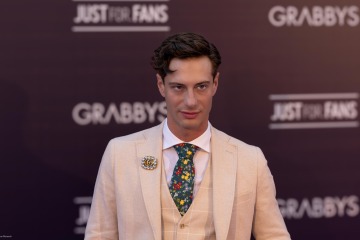 Ryan Orion presenting elegant masculine fashion at Grabbys Europe 2026